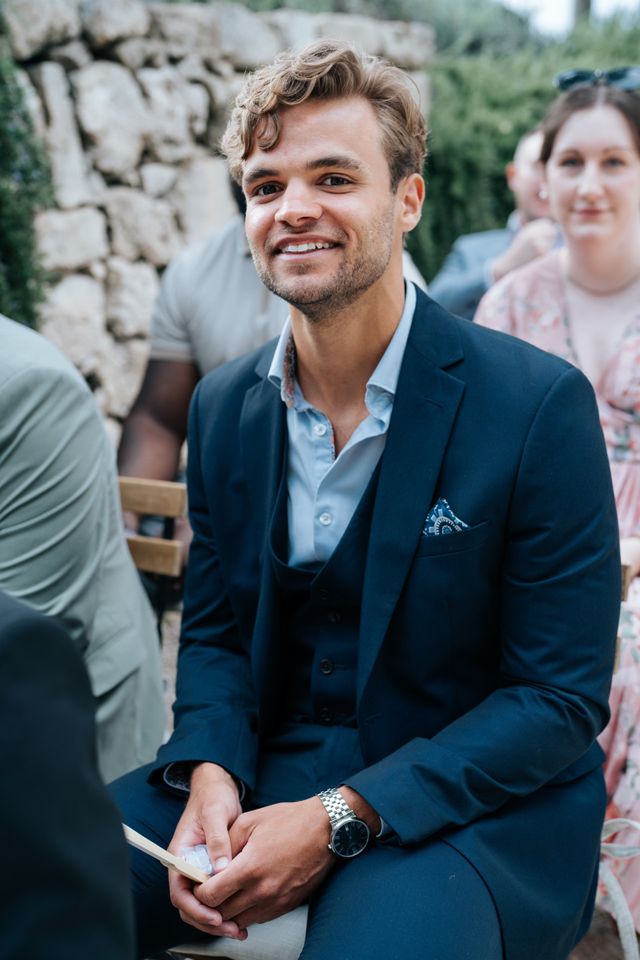 Man at a wedding in cocktail attire