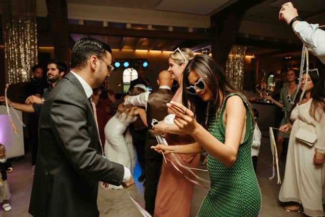 Guests dance freely at the reception.