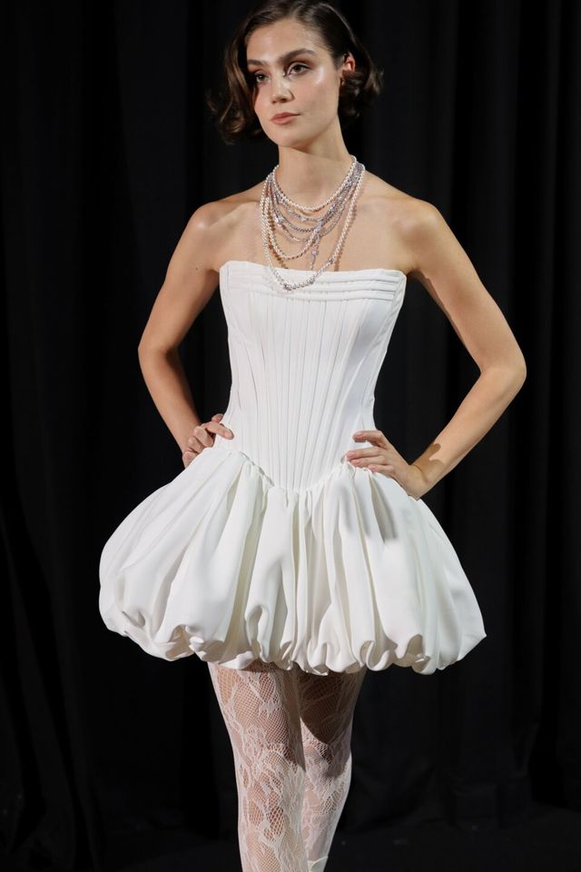 robe de mariée avec peplum de justin alexander