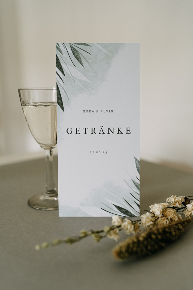 Menükarte und Sektglas