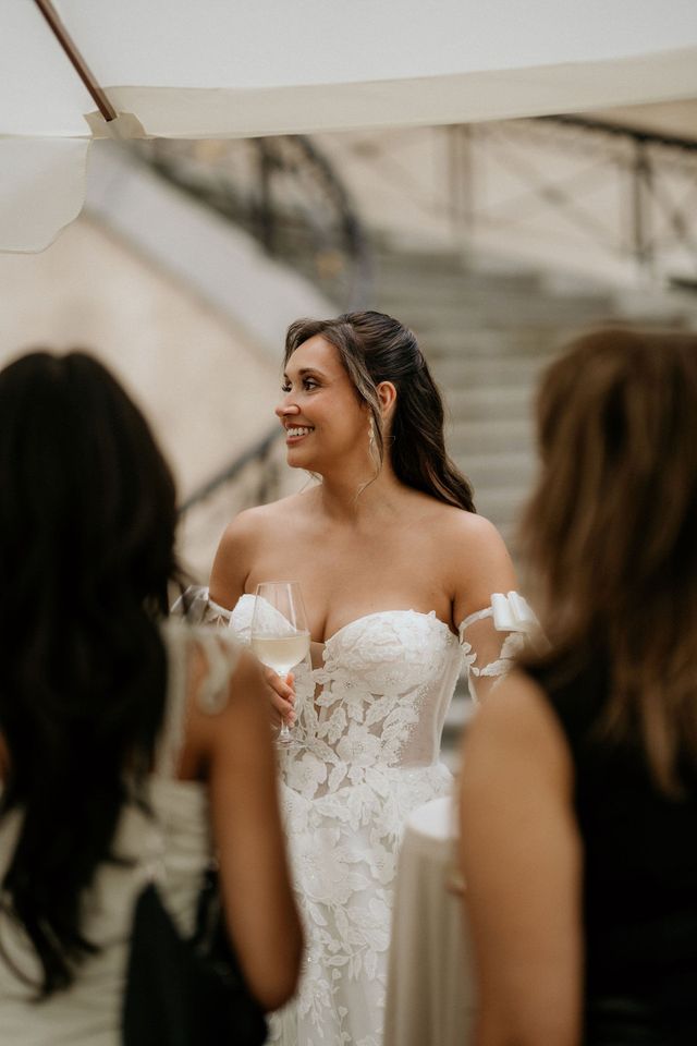 Guest in an elegant semi-formal dress at cocktail hour