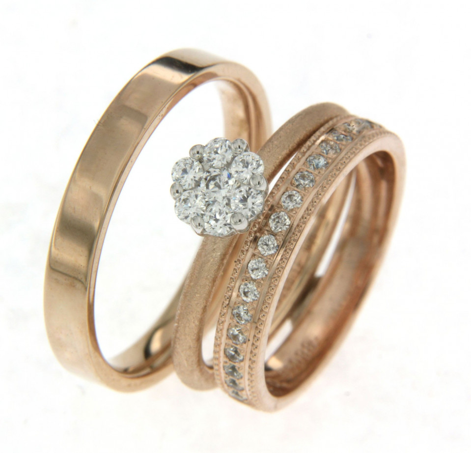 drie ringen met diamanten in roségoud