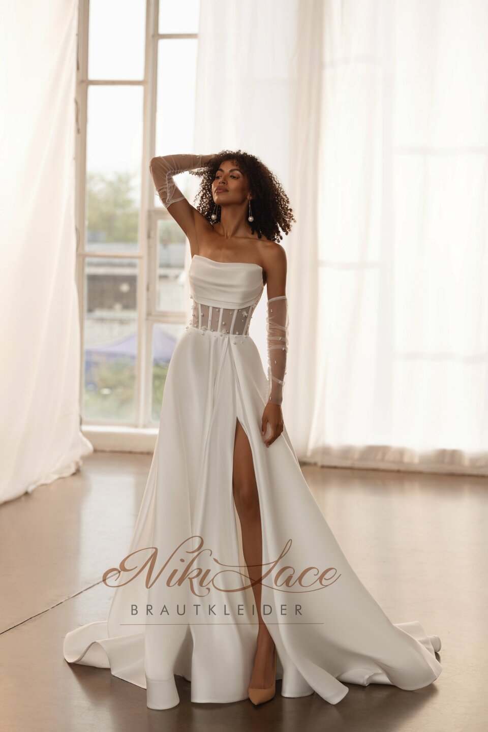 Trouwjurk van Niki Lace Brautkleider impressie