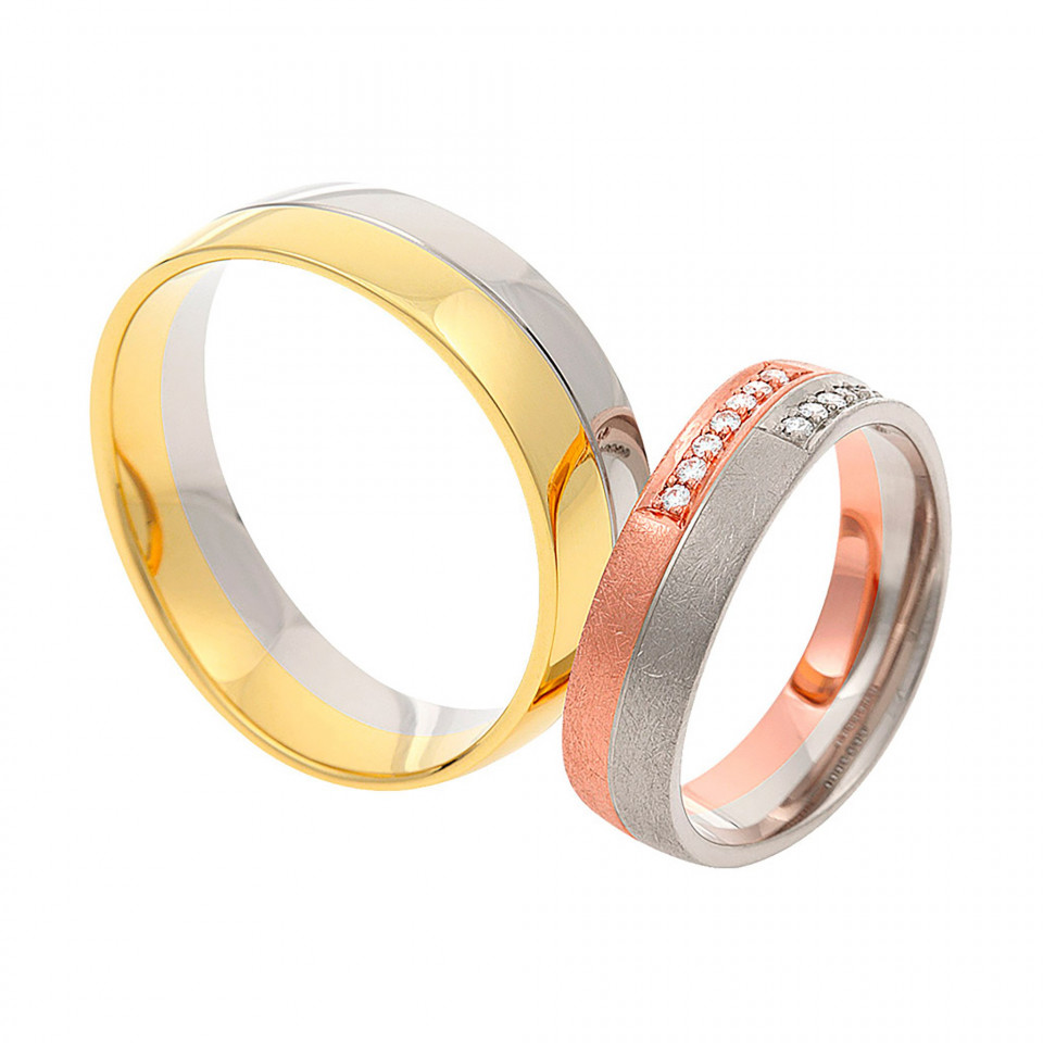 twee trouwringen met diamanten in goud en zilver