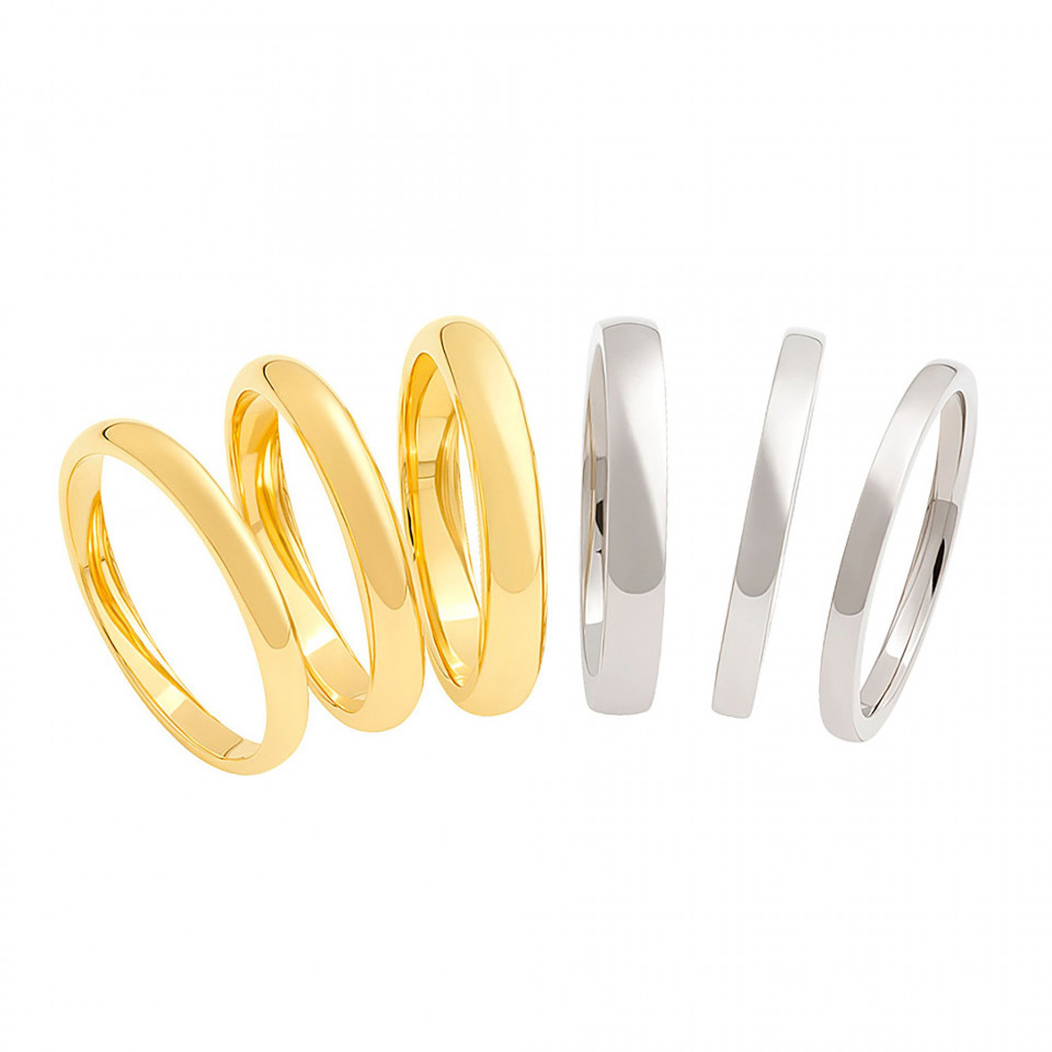 drie verschillend gekleurde gouden en zilveren trouwringen