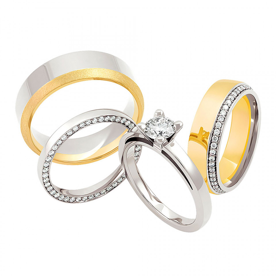 drie trouwringen met diamanten in verschillende kleuren