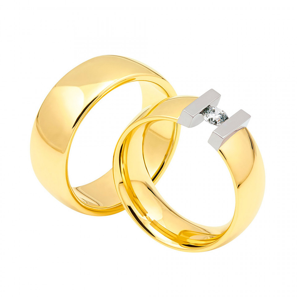 twee gele gouden trouwringen met een diamant in het midden