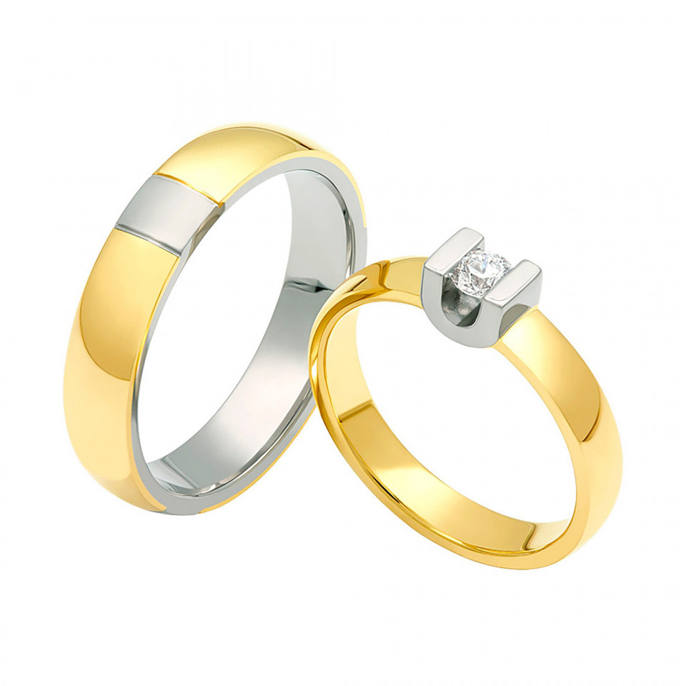 twee gele gouden trouwringen met diamant in het midden