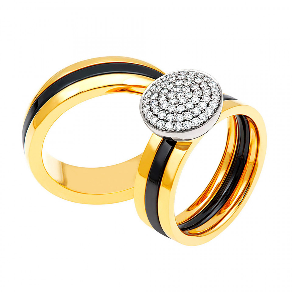 twee gouden en zwarte diamanten trouwringen