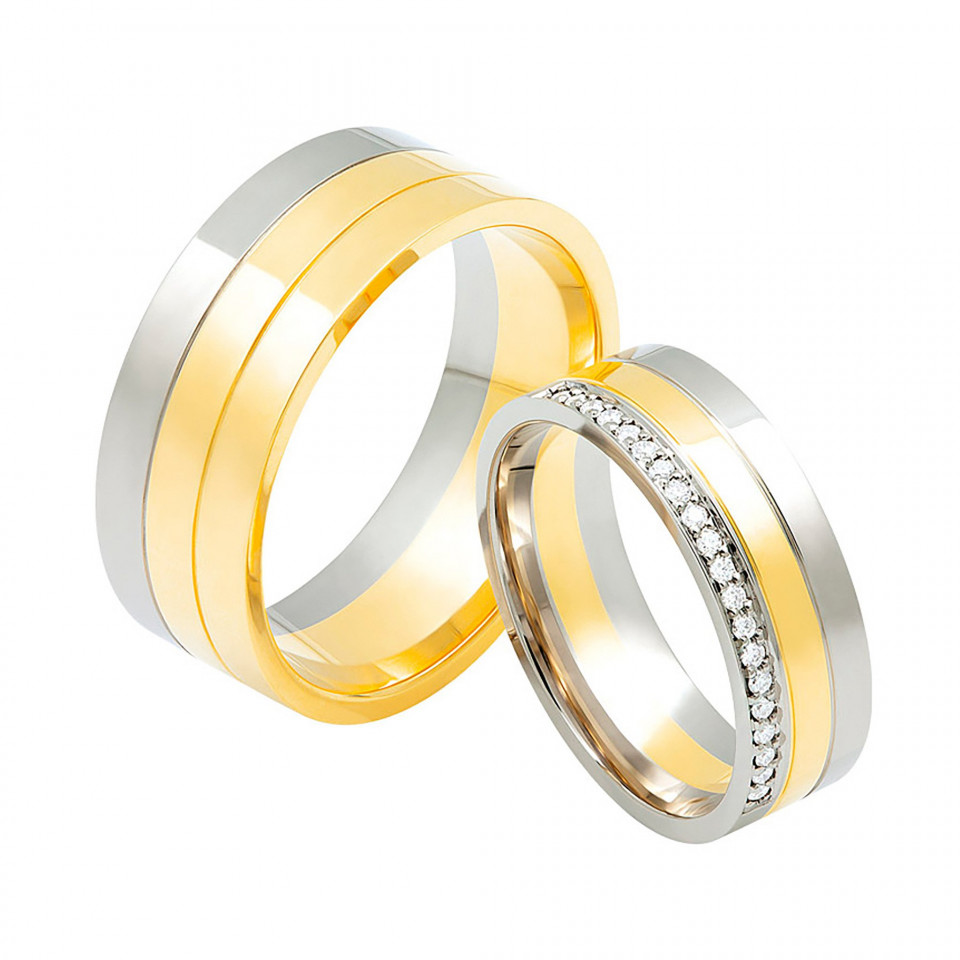 twee trouwringen met diamanten in geel en witgoud