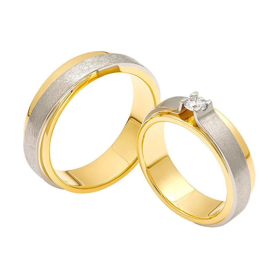 twee trouwringen van geel goud met diamanten