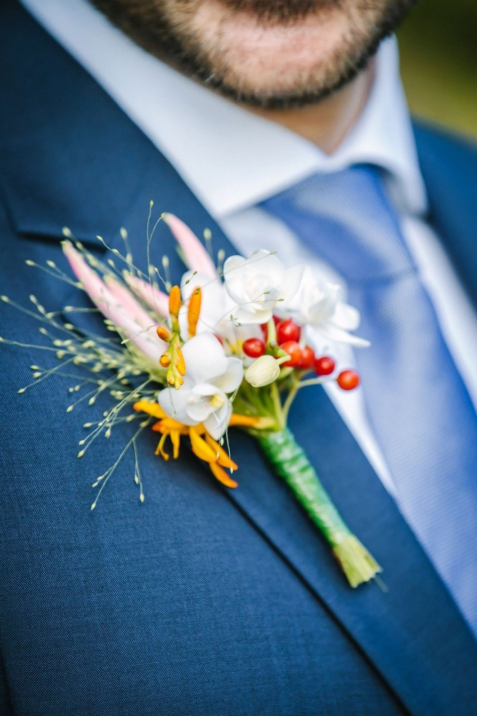 Wedding Boutonnieres: Who Wears Them, Styles, and Costs