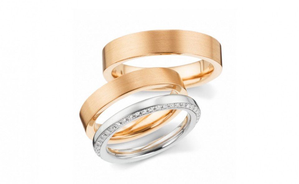 drie ringen in witgoud en roségoud