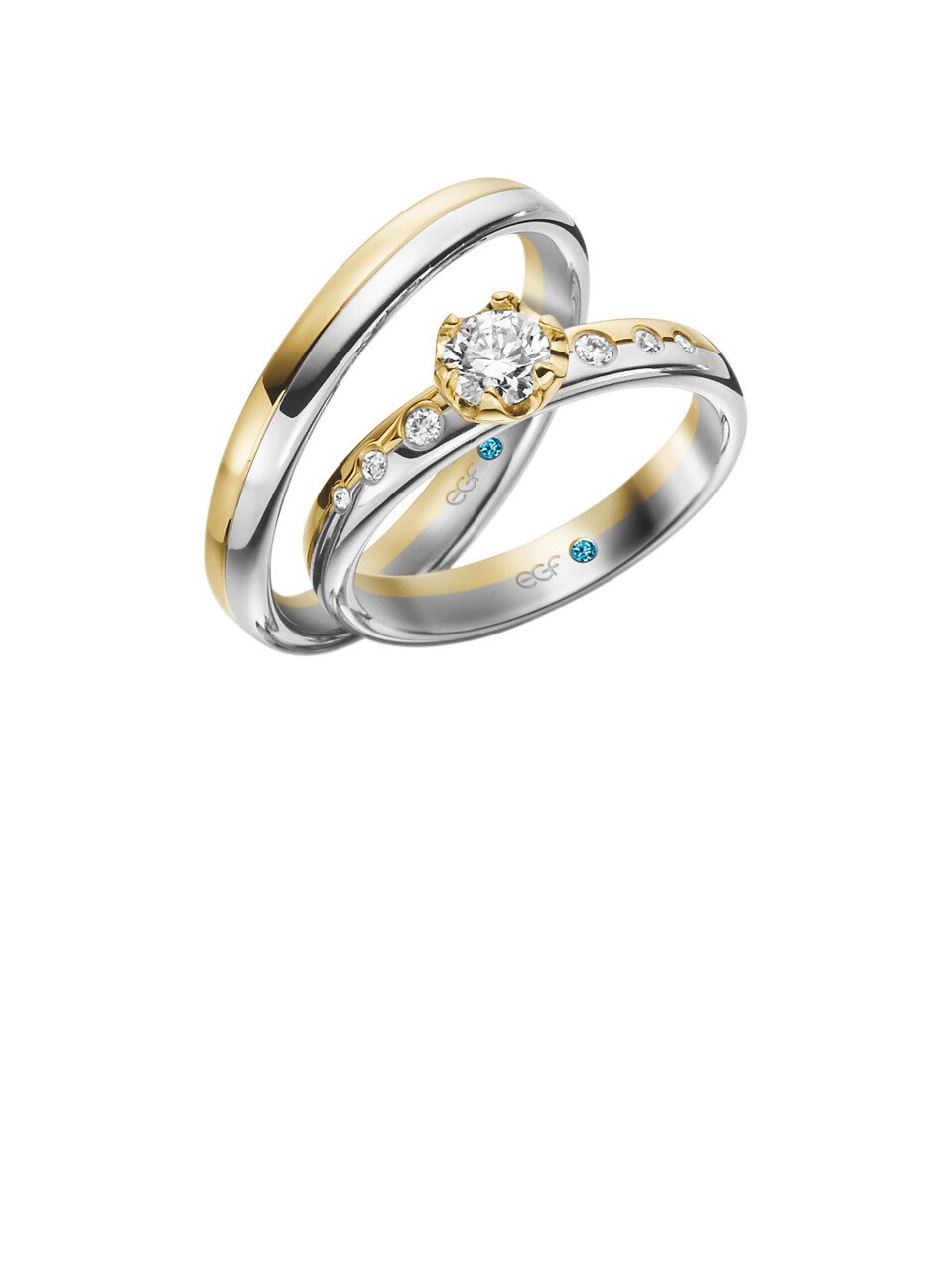 twee trouwringen met diamanten aan de zijkanten