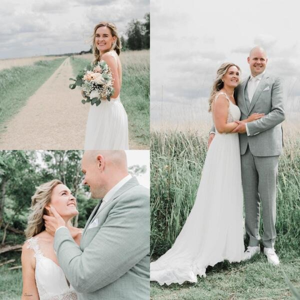 bruid en bruidegom op het veld op hun bruiloft