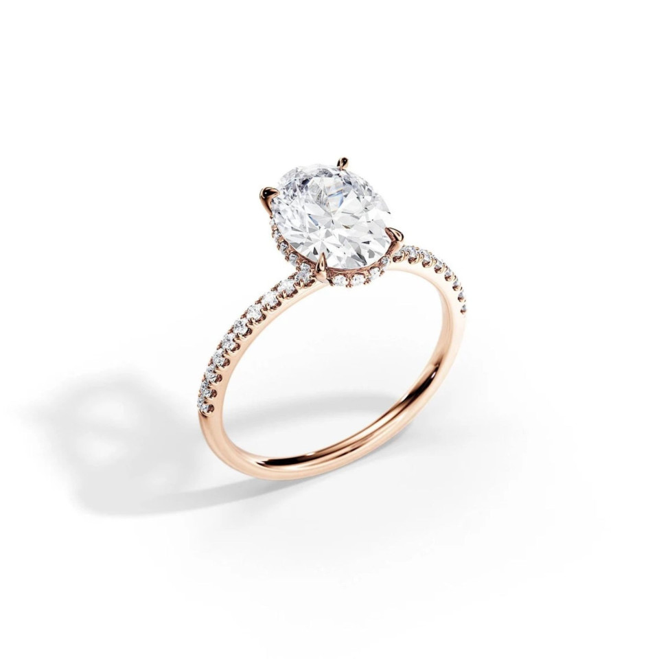 een ovale diamanten verlovingsring in roségoud