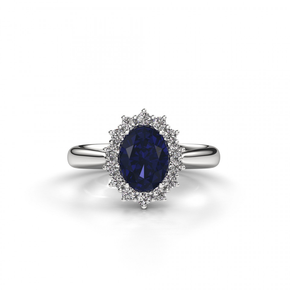 een ovale blauwe saffier en diamanten ring