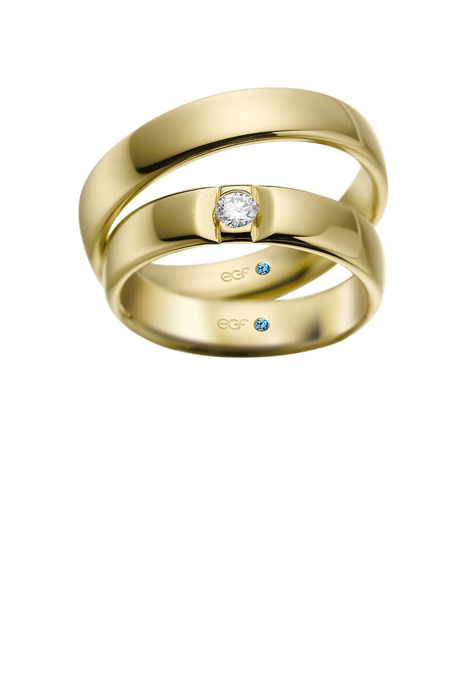 twee trouwringen met een diamant in geelgoud